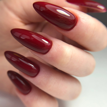 Glossy Almond Shape Nails – Deep Red & Brown Elegant Finish